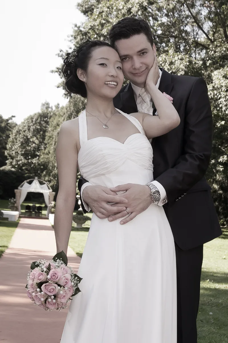 Couple portrait in front of classical architecture